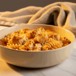 Paste gratinate cu pui si sos de branzeturi